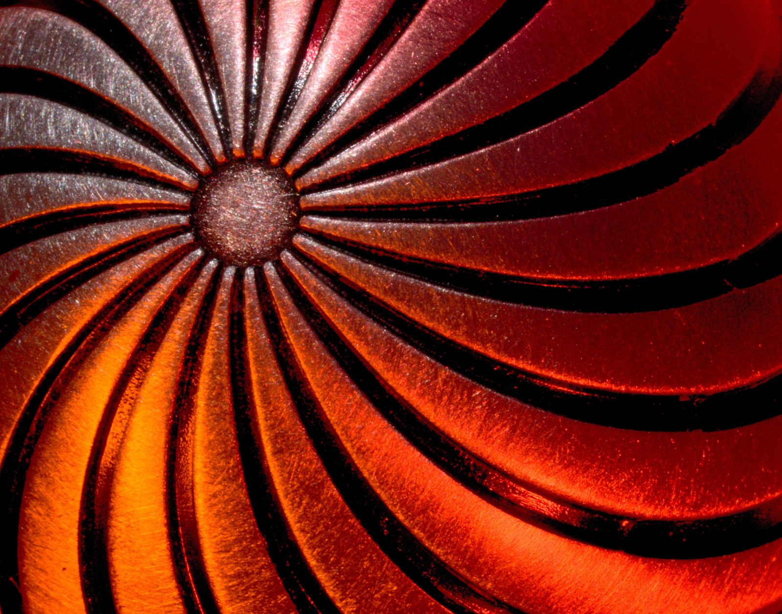 Tequila Sunrise! Close-up view of a metal stopper from a bottle of tequila;